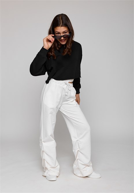 {{photo.Alt || photo.Description || 'Брюки'}}